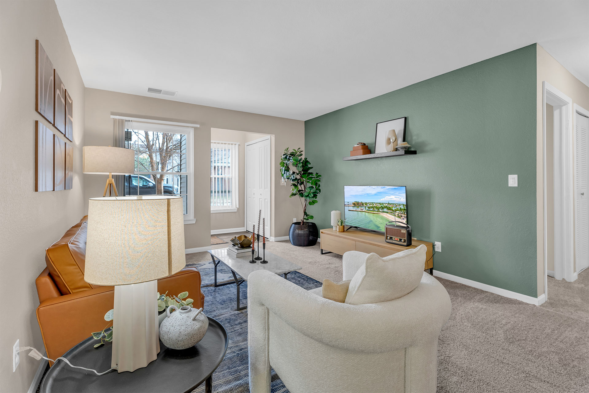 MAP-021425-017 exterior rendering of a brand new three-story apartment building and the parking lot